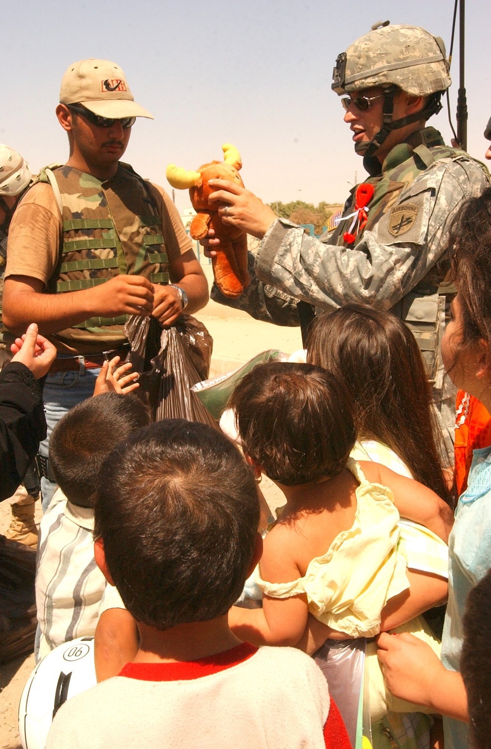 Capt. Christopher Ortega shows off a stuff animal