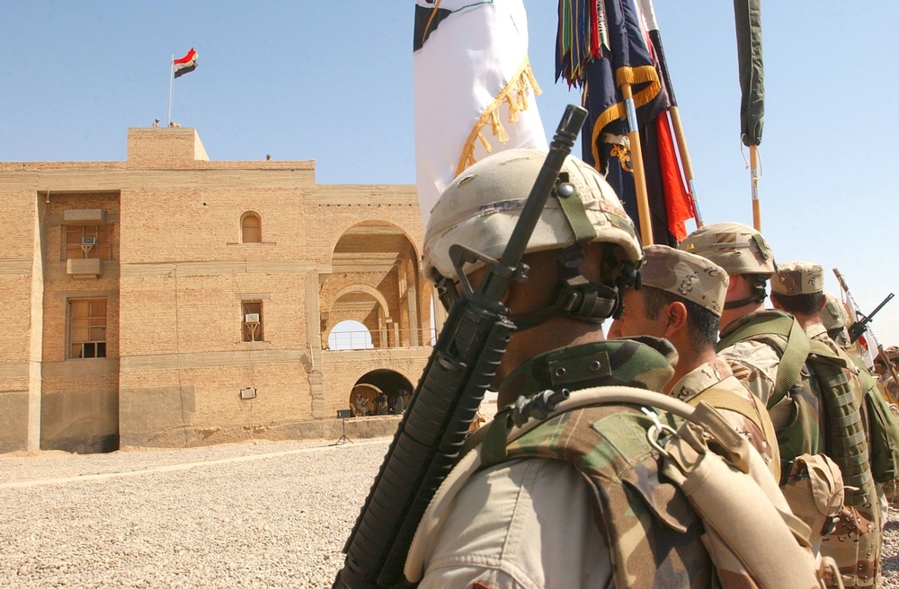 The Iraqi Colors fly over Forward Operating Base Omaha