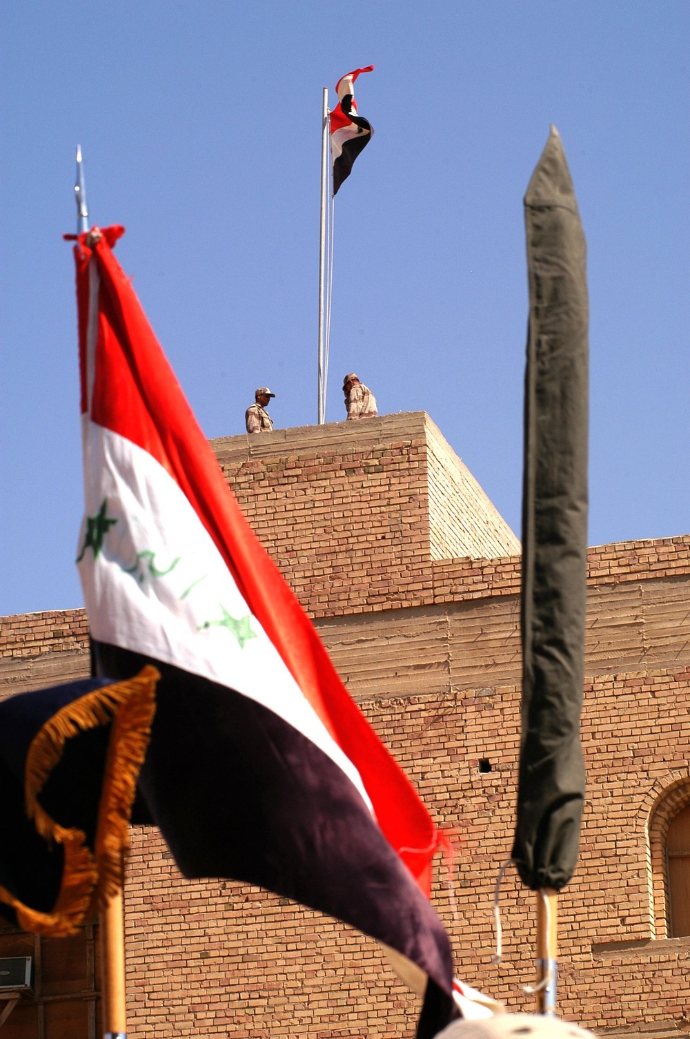 The Iraqi Colors fly over Forward Operating Base Omaha