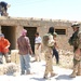 Iraqis work to build a school in the Diyala Providence