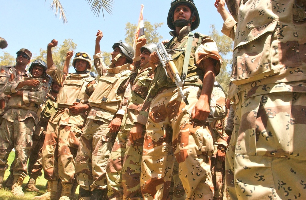 Iraqi Army soldiers cheer