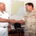 Vice Adm. David Nichols welcomes in French Vice Adm. Jacques Maz