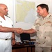 Vice Adm. David Nichols welcomes in French Vice Adm. Jacques Maz