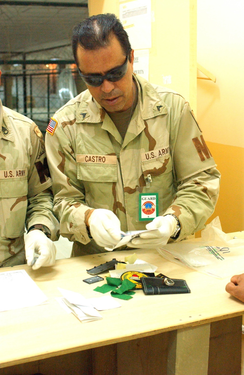 SGT Castro checks a prisoners belongings