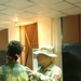 SPC arrasquillo checks a detainees identification