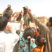 IA Soldiers distribute food, toys and supplies to the people of Tikrit