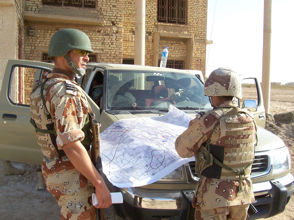 IA Soldiers use maps to locate objectives