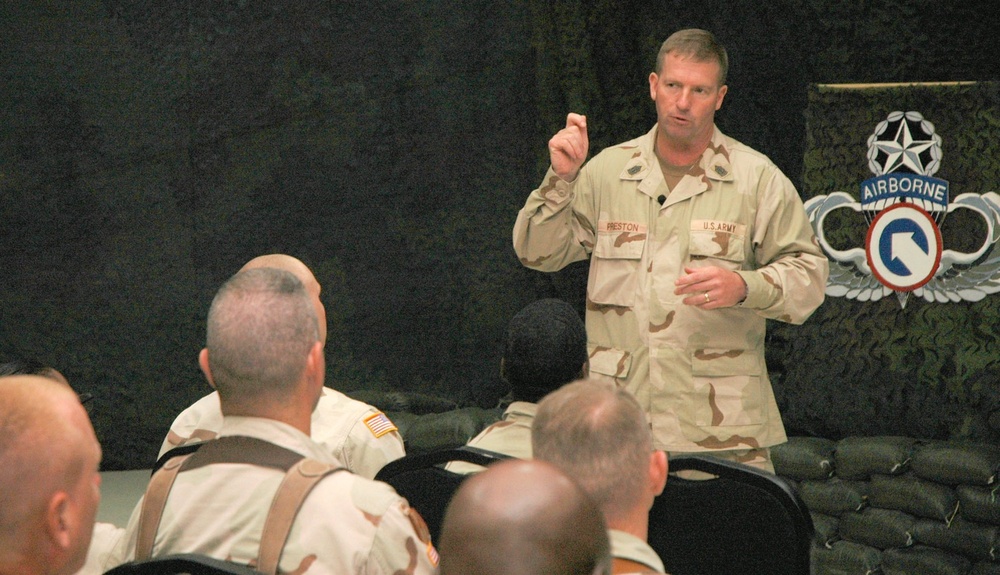 SMA Preston speaks to an audience of Soldiers and airmen