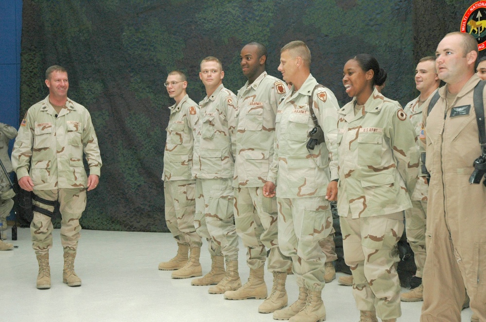 SMA Preston hands out coins to select NCOs