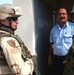 LT Brillhart talks with an Iraqi Police Officer