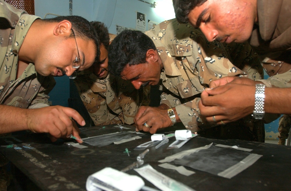 Iraqi Soldiers practiced sticking veins with an IV