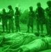 Iraqi Soldiers secure the males from an Iraqi household