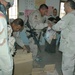 Soldiers pay a special visit to about 300 children at Baghdad Airport Prima