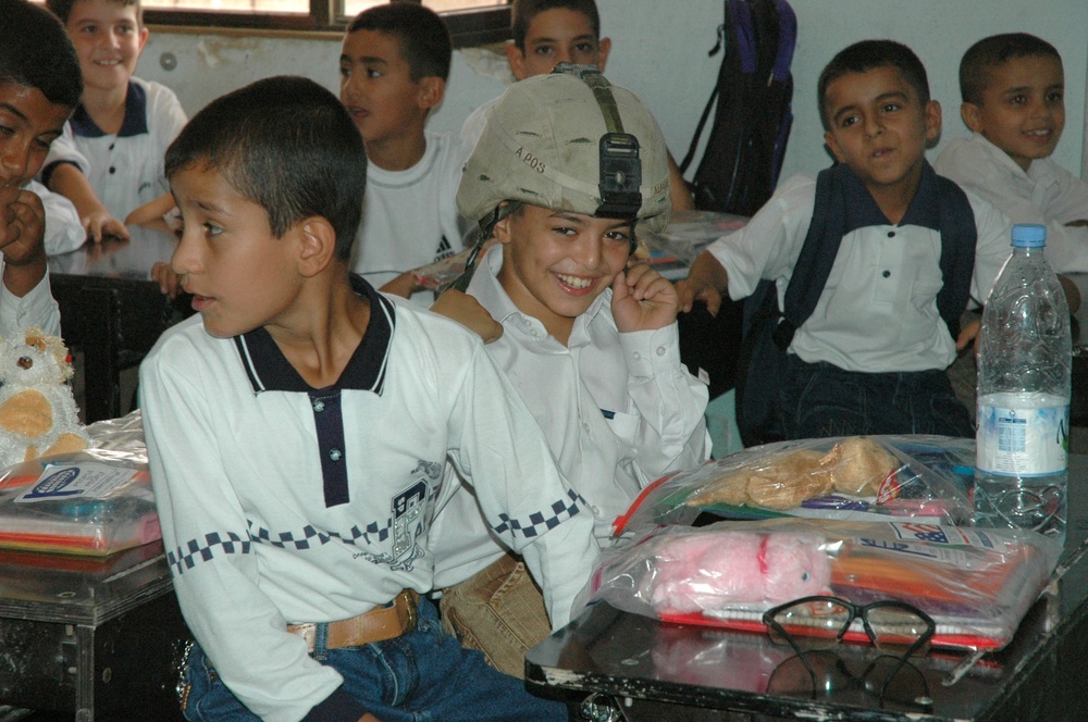 Soldiers pay a special visit to about 300 children at Baghdad Airport Prima