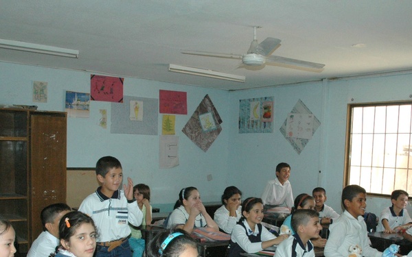 Soldiers deliver OIC school supply kits