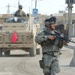 Staff Sgt. Fox pulls security in an intersection in Tall Afar