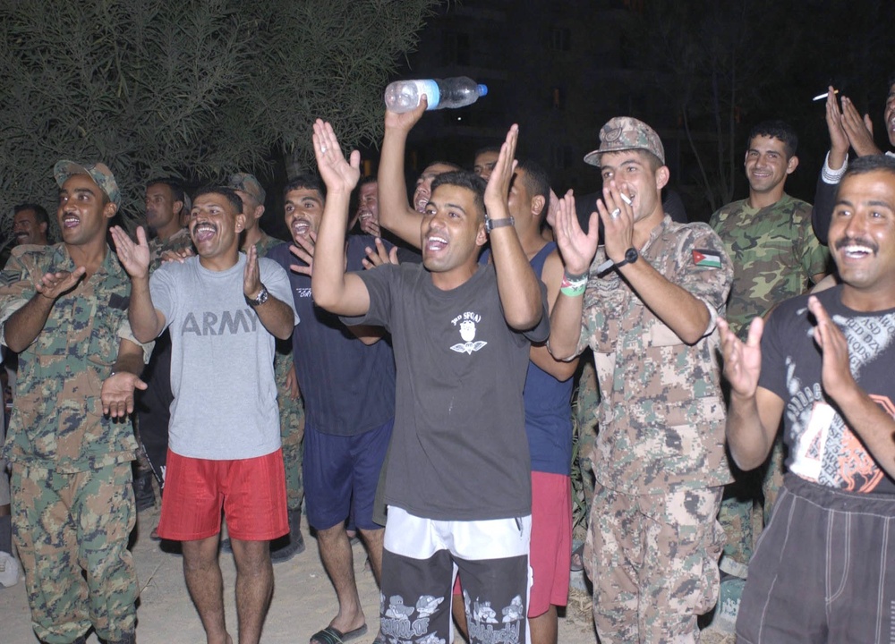 Jordanian soldiers cheered for both German and Jordanian teams