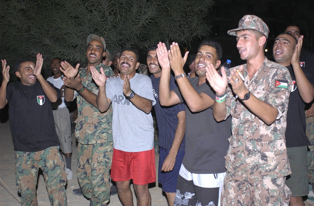 Jordanian soldiers cheered for both German and Jordanian teams