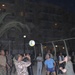 A Jordanian soldier volleys the ball