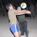 Two German soldiers collide while trying to hit the ball