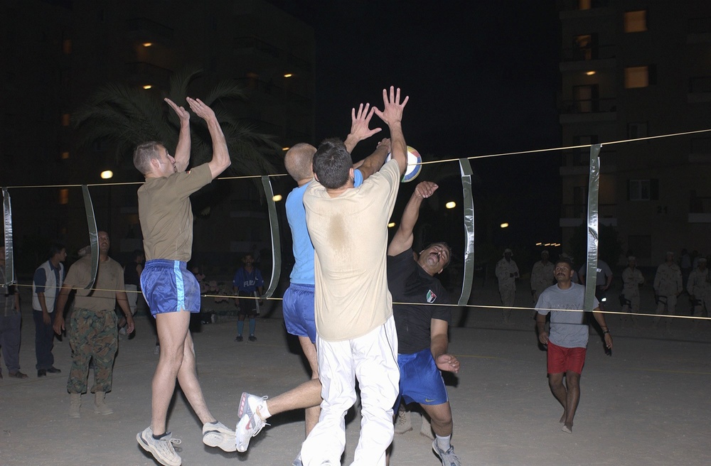 Three German players block a spike