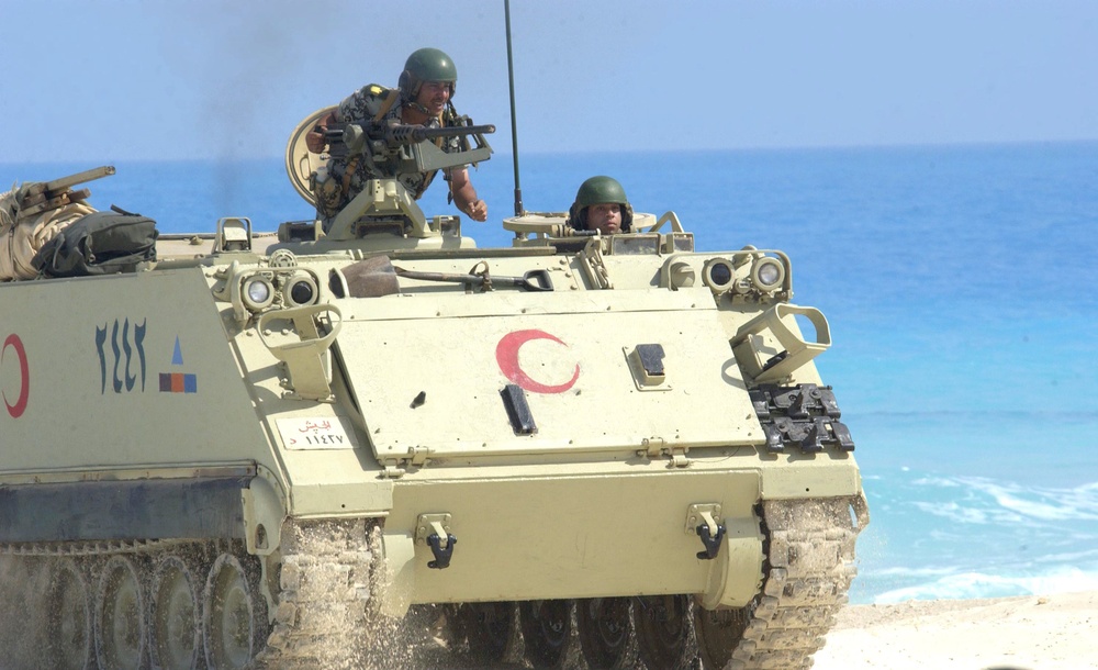 An Egyptian personnel carrier rolls onto shore