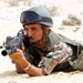 A Jordanian soldier gets in a non supportive prone firing position