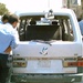 Iraqi Police inspect a car bomb