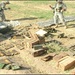 Soldiers unearth a weapons cache