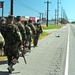 Ohio Army National Guard Soldiers march down a road