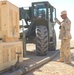 US Soldiers position crates of equipment