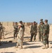 US Soldiers unload hoses and other equipment