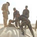 US Soldiers place sandbags at a fueling point