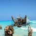 U.S. Marines disembark a landing craft utility ship