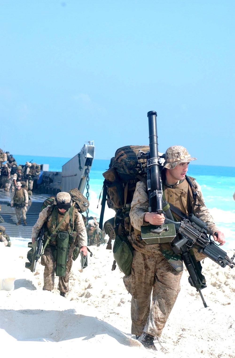 U.S. Marines disembark a landing craft utility ship