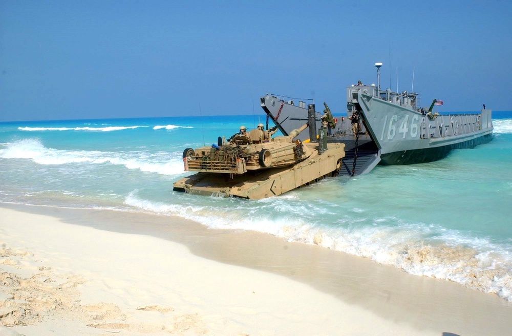 U.S. Marines disembark a landing craft utility ship