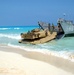 U.S. Marines disembark a landing craft utility ship