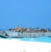 U.S. Marines disembark a landing craft utility ship