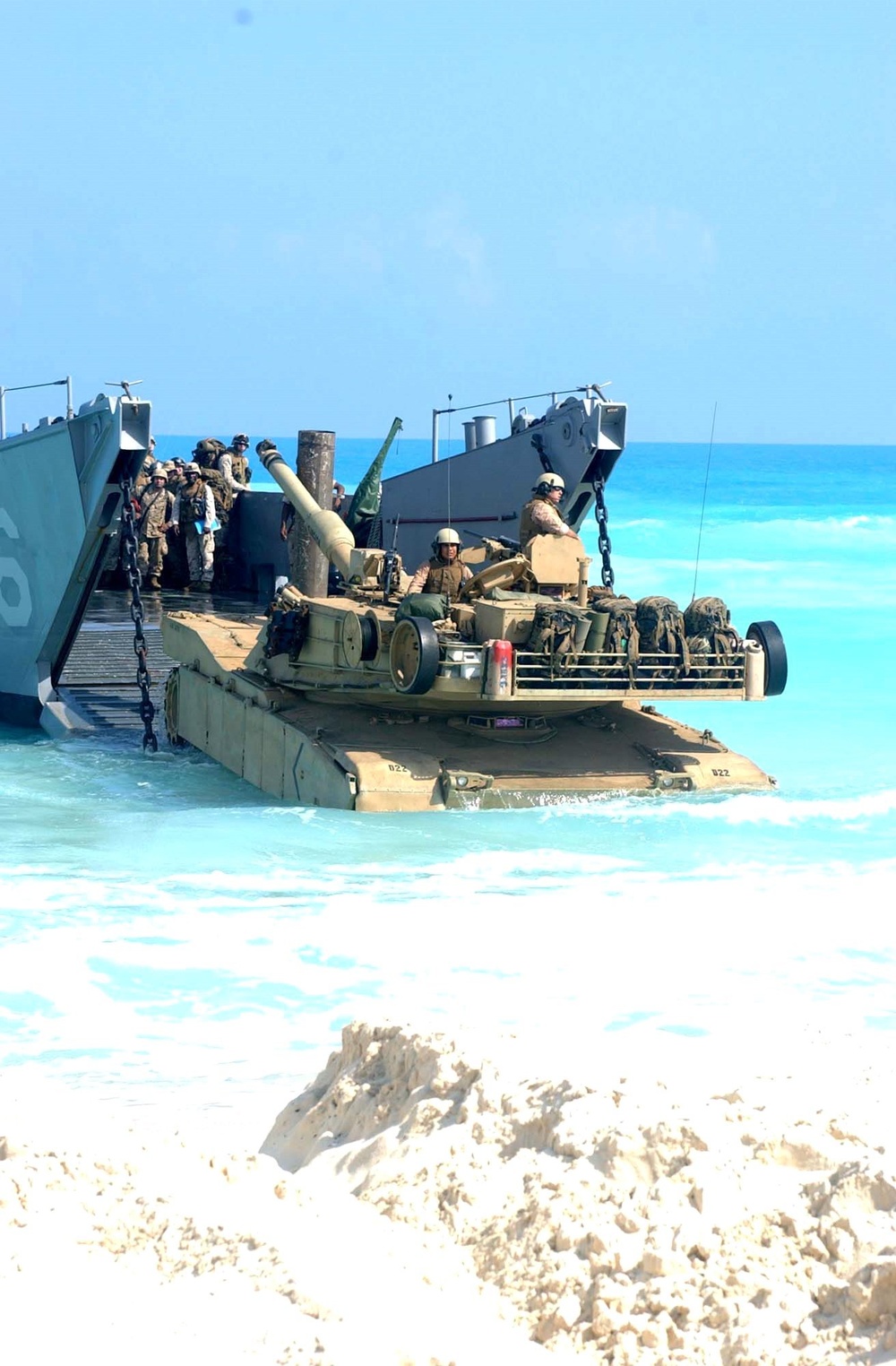 U.S. Marines disembark a landing craft utility ship