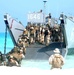 U.S. Marines disembark a landing craft utility ship