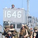 U.S. Marines disembark a landing craft utility ship