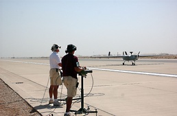 Two Pilots bring a Hunter UAV to a safe landing