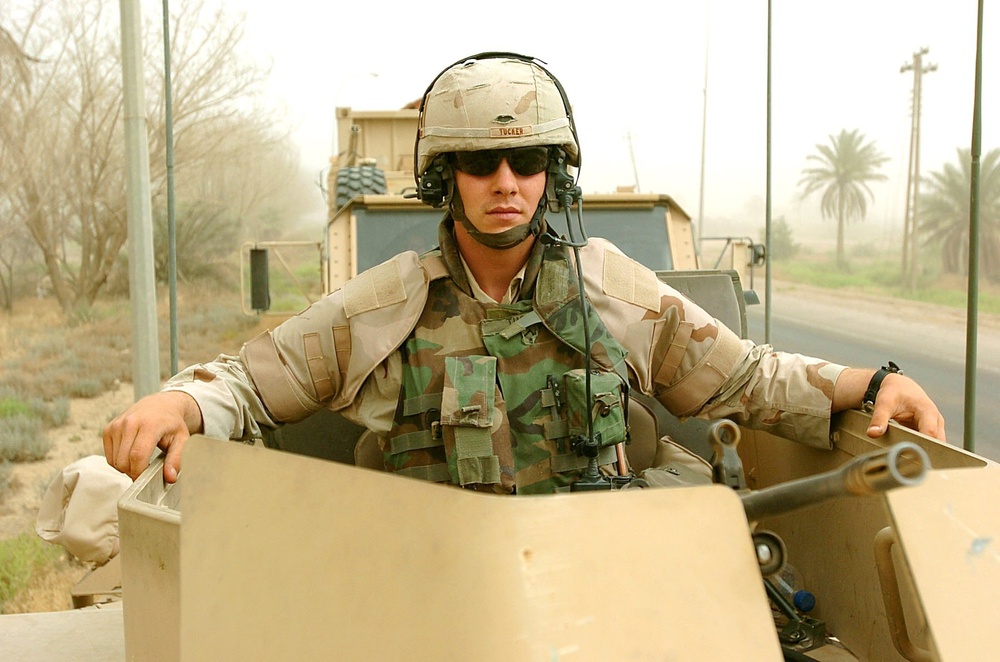 Pvt. Tucker in his humvee turret