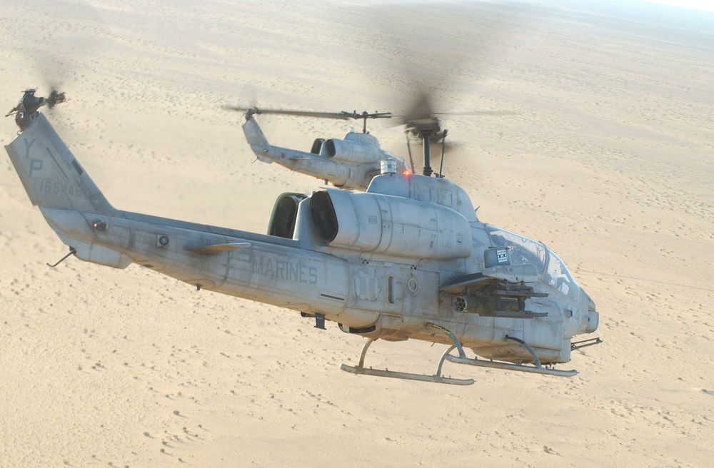 Two A1-H Super Cobra helicopters