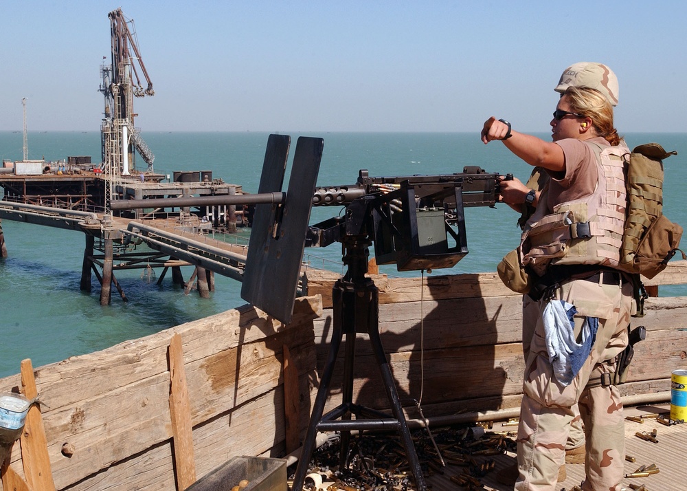 Gunner's Mate 2nd Class Elizabeth Campos gives directions during rou