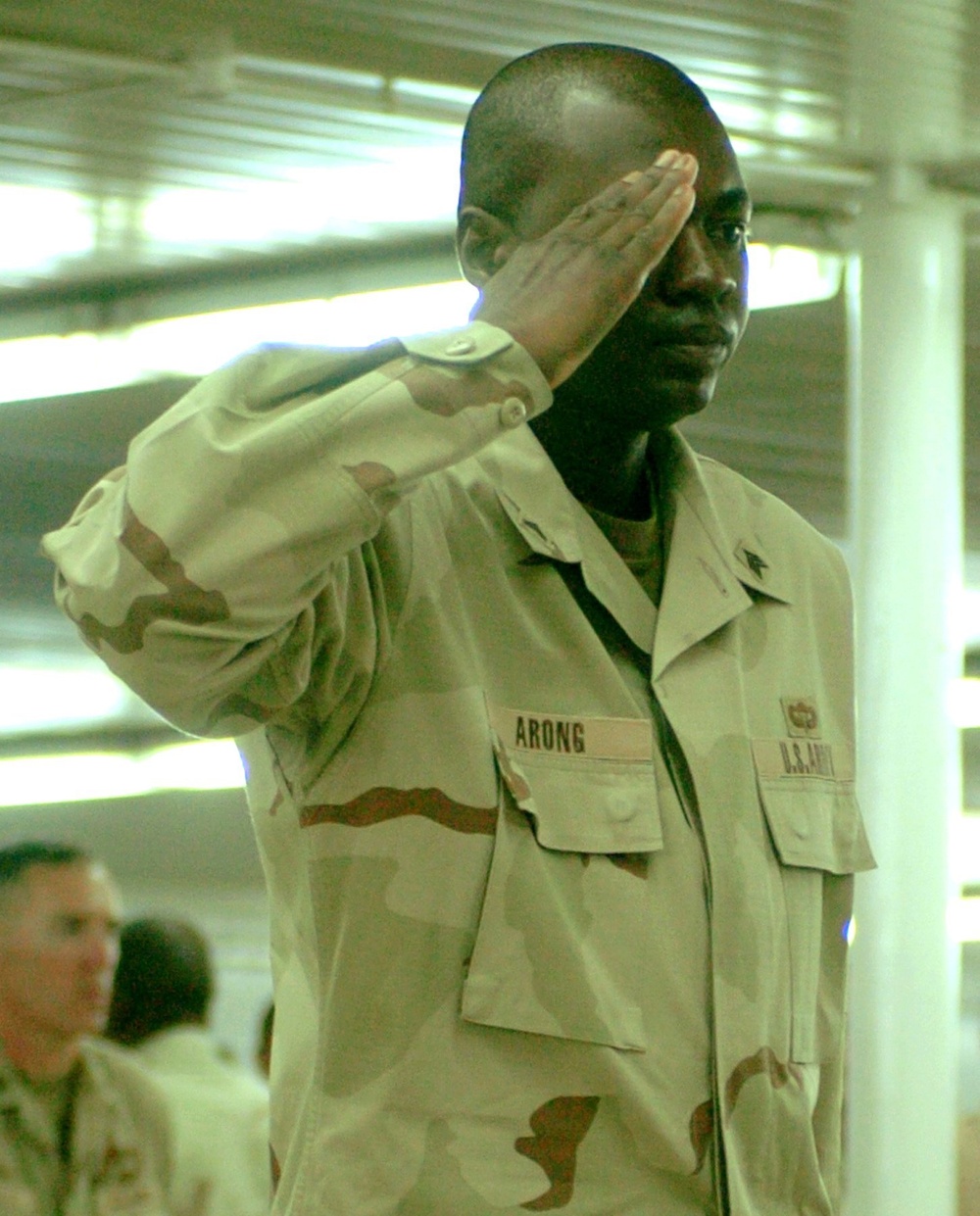 Sgt. Leo Arong salutes Staff Sgt. Jonaus and Sgt. Vilorio at their memorial