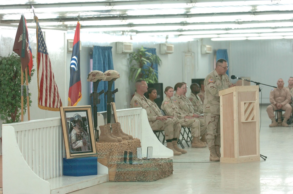 Lt. Col. Ronnie W. Long honors Staff Sgt. Jonaus and Sgt. Vilorio at their