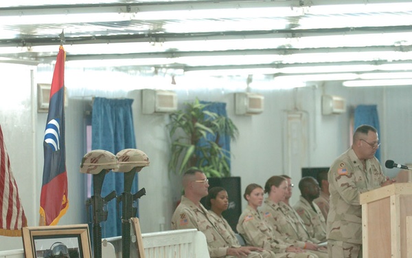 Lt. Col. Ronnie W. Long honors Staff Sgt. Jonaus and Sgt. Vilorio at their