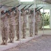 The Brigade Troops Battalion Honor Guard renders a 21-gun salute