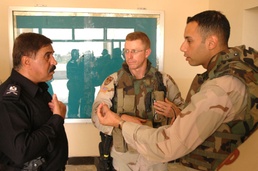 MAJ Johnson talks to GEN Hussein through an interpretor